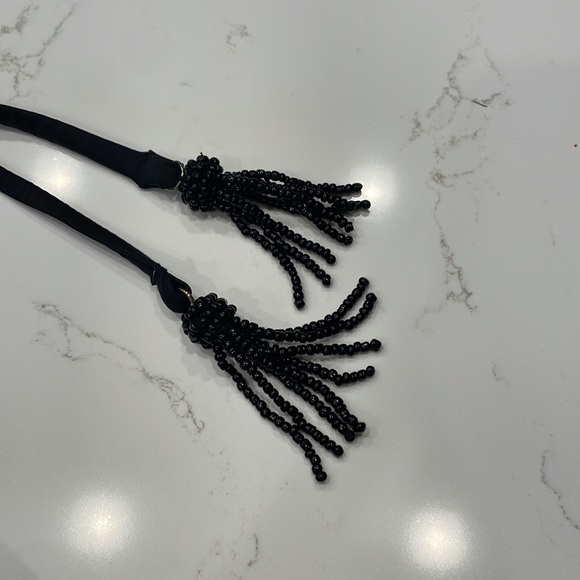 Palmacea, one piece, tied swimsuit with cut outs.  
Size M - Picture 4 of 12